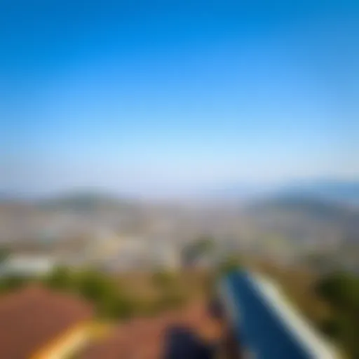 A panoramic view of Gyeongju under clear blue skies, showcasing the landscape's natural beauty.
